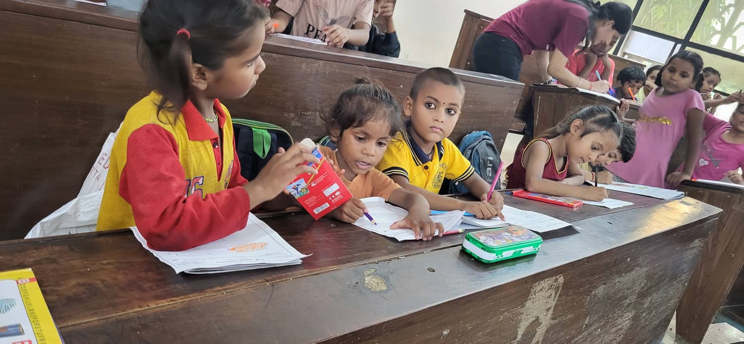 Children learning together in a classroom